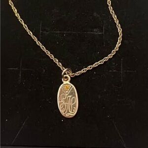 Unique Gold-tone necklace with pendant. Oval. Simple. Classic. Monogram